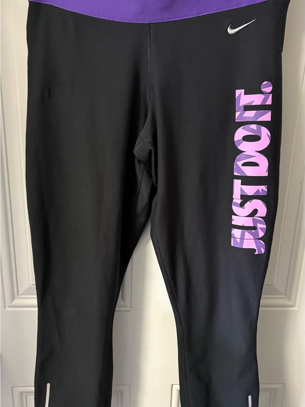 Nike Women’s Black Leggings with Purple Waistband and Purple Graphic